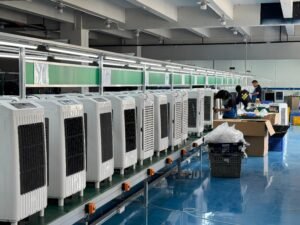 Mass production line at Woside factory showing rows of evaporative air cooler semi-finished products with clean premium plastic housing.